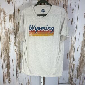 Wyoming, Short Sleeve Tee - Cream and Blue. Used condition. Size Large.